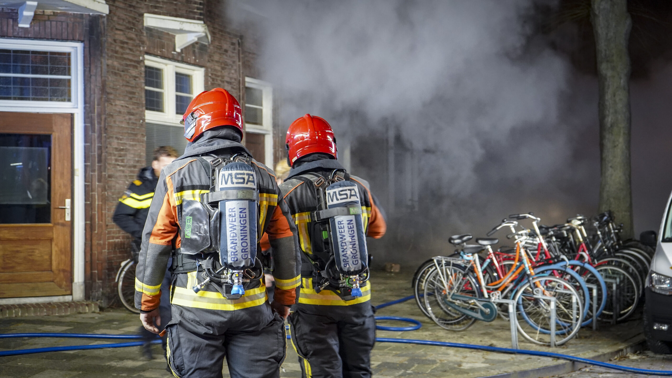 Bewoner gewond bij brand woning Koninginnelaan